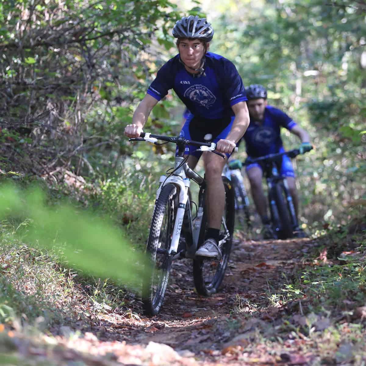 mountain biking down the trail